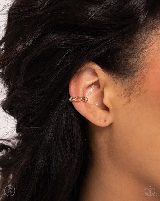Mandatory Musings - gold - Paparazzi ear cuff