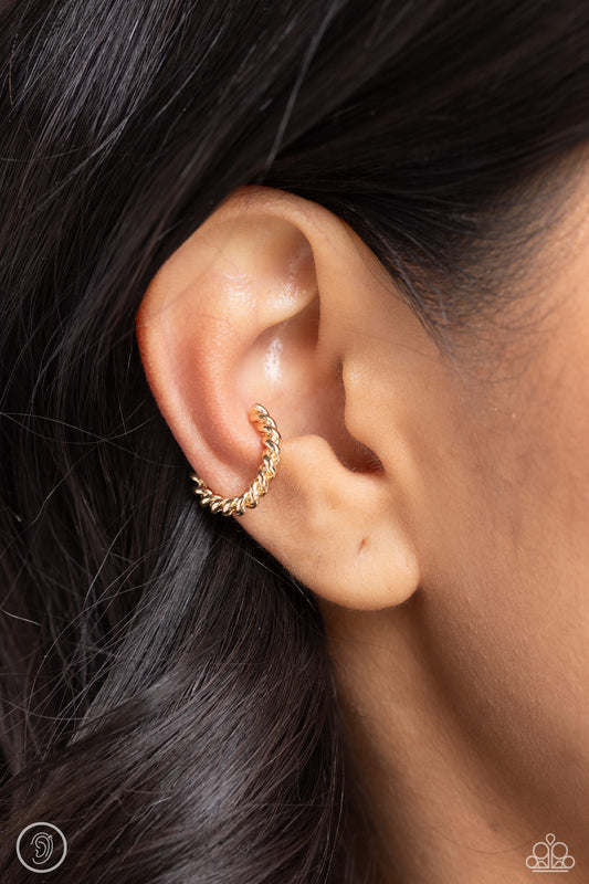 Twisted Travel - gold - Paparazzi ear cuff