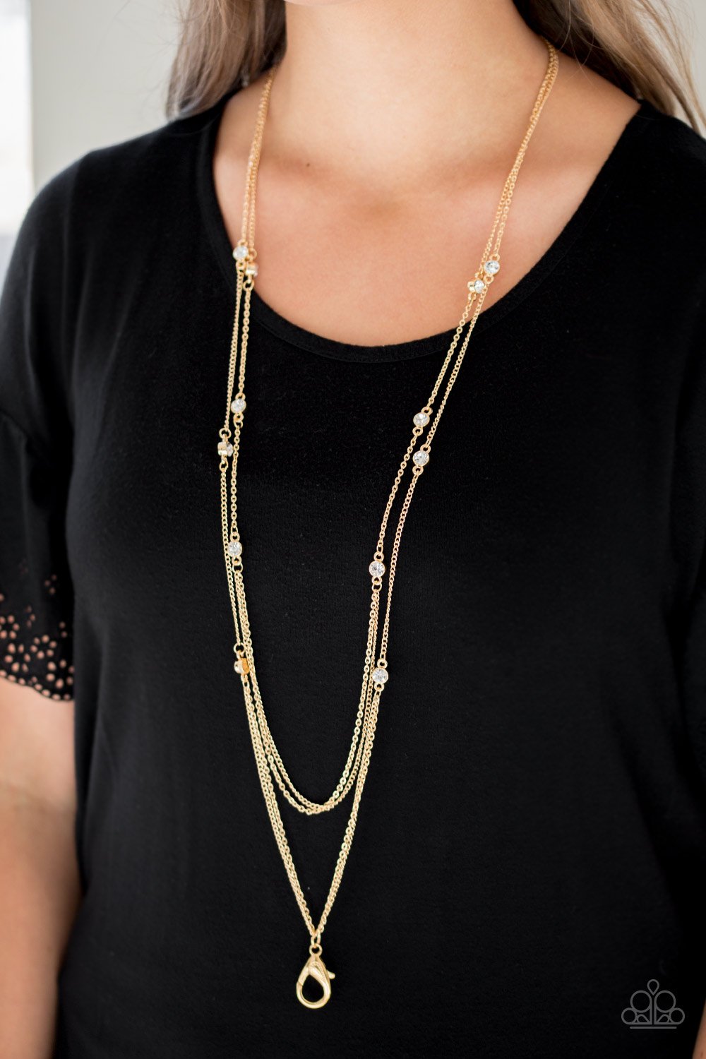 Sparkle of the Day-gold-Paparazzi LANYARD