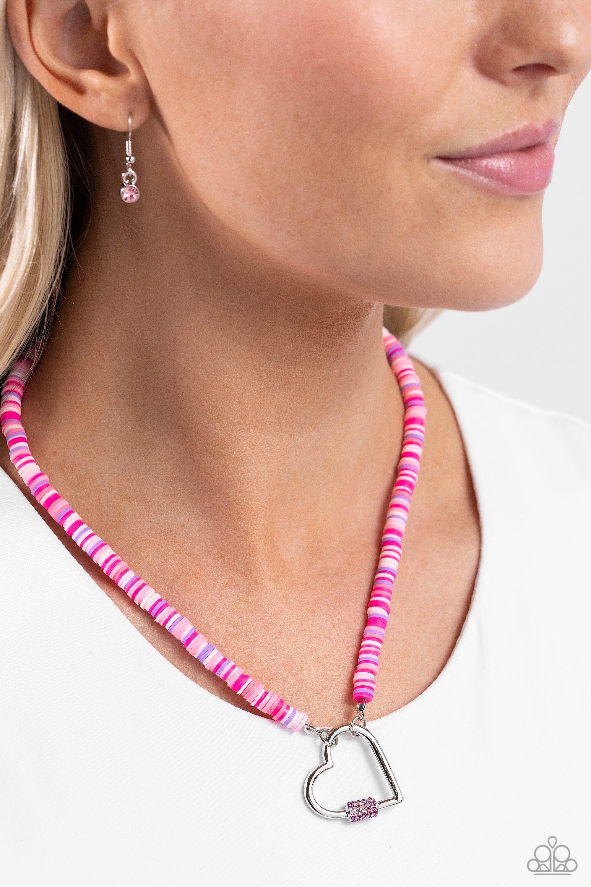 Hot pink necklace on sale display