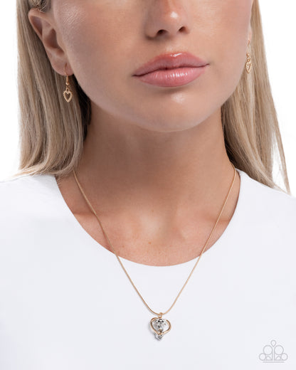 Delightful Dog - gold - Paparazzi necklace