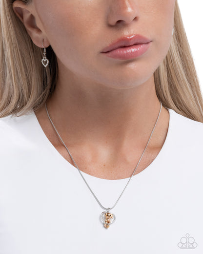 Delightful Dog - silver - Paparazzi necklace