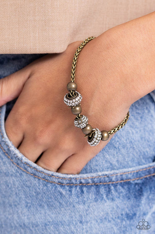 Draped Dedication - brass - Paparazzi bracelet