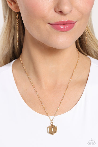 Emblematic Elegance - gold - T - Paparazzi necklace