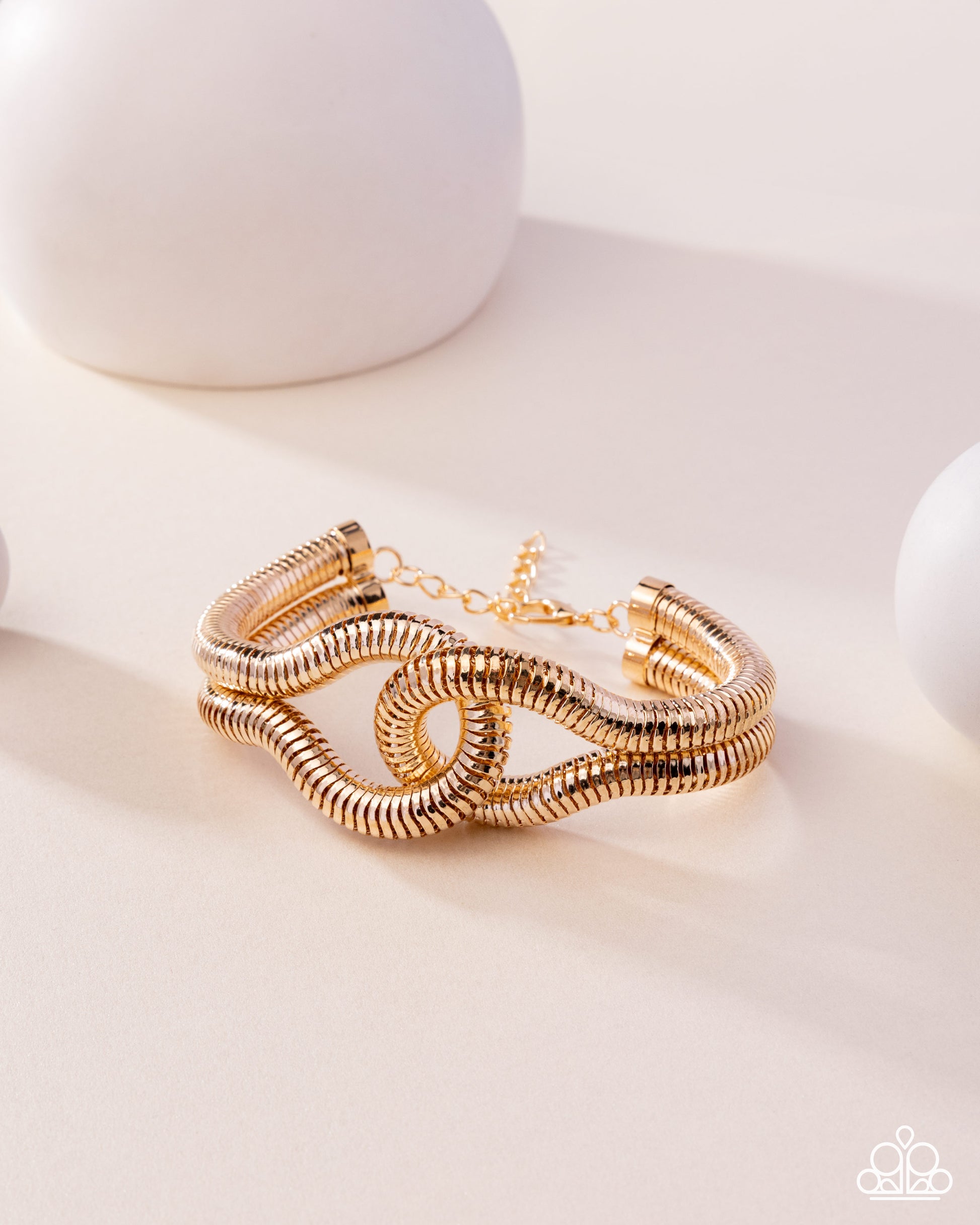 Interlocked Ignition - gold - Paparazzi bracelet