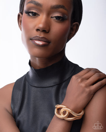 Interlocked Ignition - gold - Paparazzi bracelet
