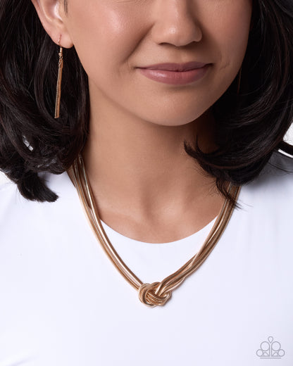 Knotted Kudos - gold - Paparazzi necklace