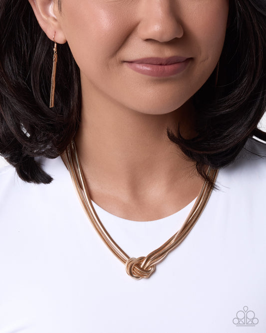 Knotted Kudos - gold - Paparazzi necklace