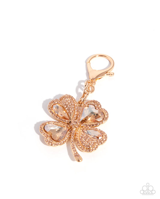 Lustrous Luck - gold - Paparazzi bag charm