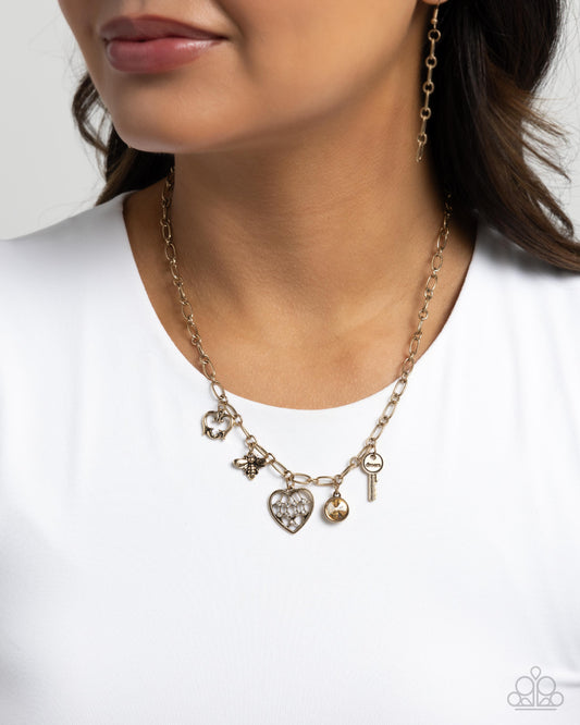 Reminiscent Reveal - gold - Paparazzi necklace