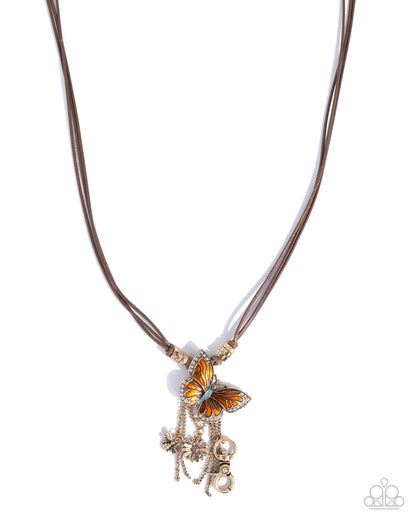 Whimsical World - orange - Paparazzi LANYARD necklace