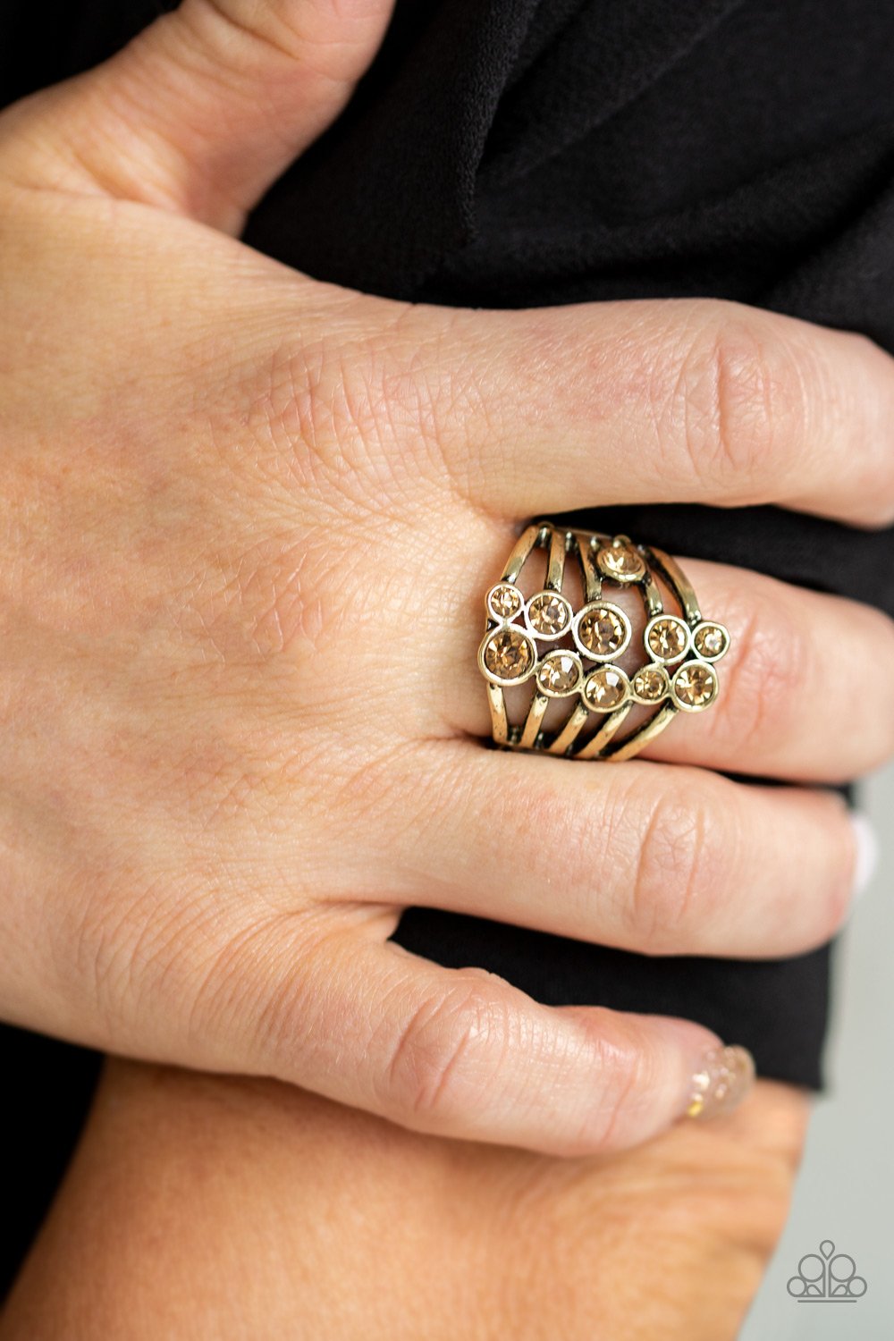 Meet in the Middle-brass-Paparazzi ring