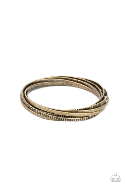 Trending in Tread - brass - Paparazzi bracelet